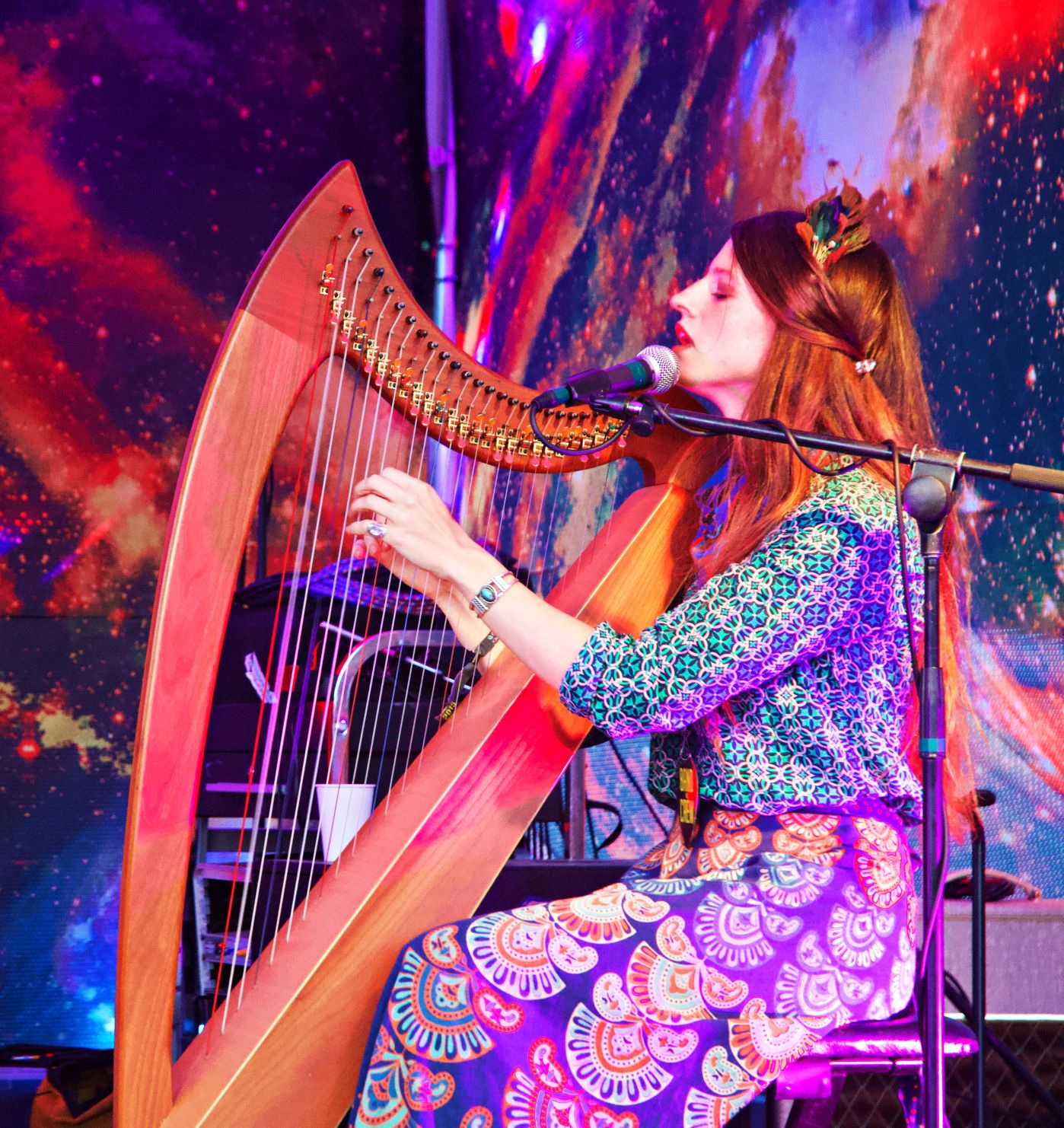 Christine Elise could be a modern day Greek goddess the way she sings & plays the harp.jpg